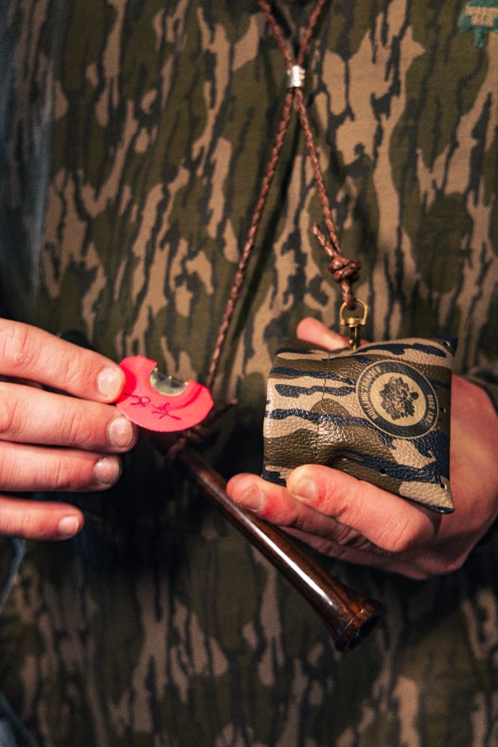 Mouth Call Pinch Pouch in Mossy Oak Bottomland with Braided Lanyard